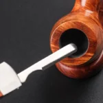 Pfeifenmesser und Reinigungswerkzeug