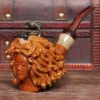 Heather hand-carved Medusa pipe in light color
