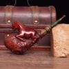 Hand-carved Photinia wood pipe is wine red with random mouth color